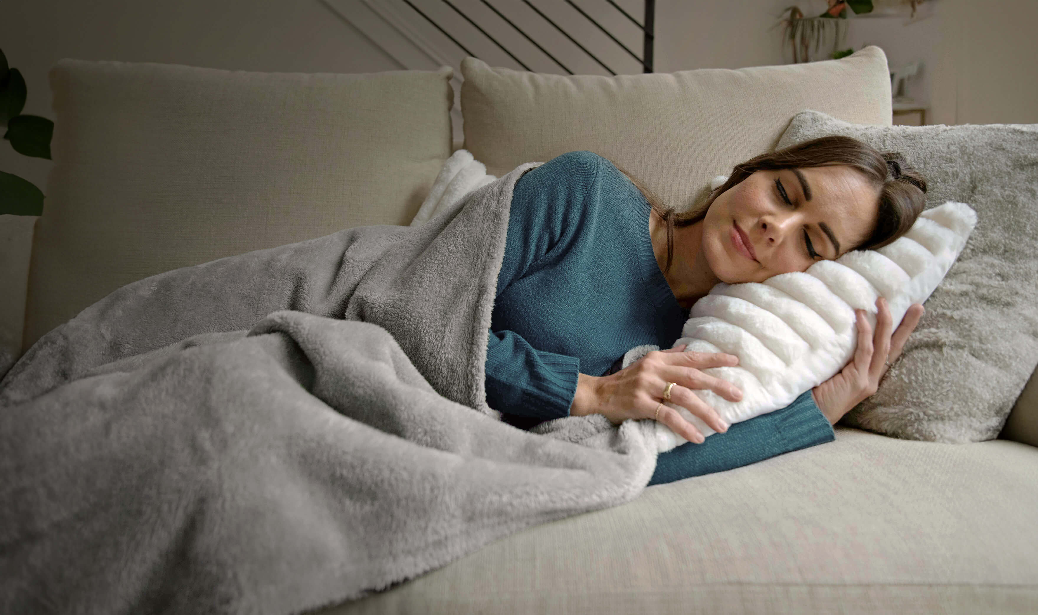 lady sleeping in peace with Heal Naturally blanket on her